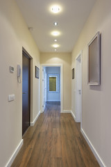 Apartment corridor with brown floor
