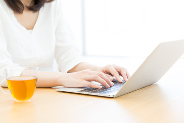 a woman using laptop