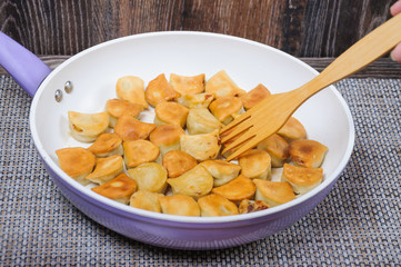 Fried dumplings in the pan