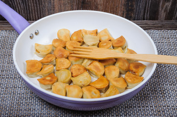 Fried dumplings in the pan