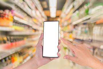 blurred image of shopping mall and people for background usage.