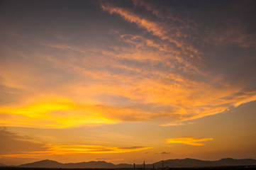 Fototapeta na wymiar Sky, Bright Blue, Orange And Yellow Colors Sunset. Instant Photo, Toned Image