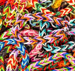 Colorful loom bracelets . Close up. Young fashion concept