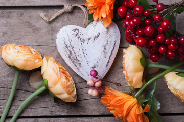Decorative heart and flowers in autumn colors