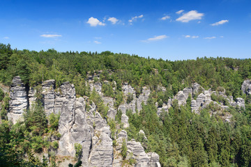 Fototapeta na wymiar Panorama with typical rock pinnacles at Bastei in Rathen, Saxon Switzerland
