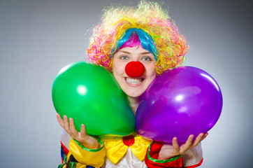 Funny clown in comical concept