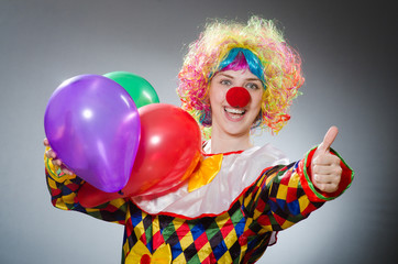 Funny clown in comical concept