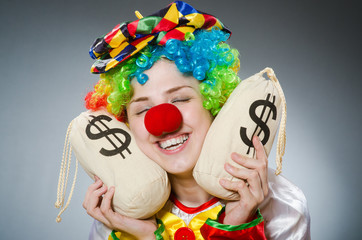 Funny clown in comical concept
