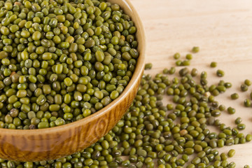 green beans on wood background