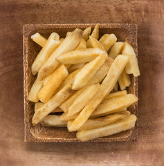 french fries on wood plate