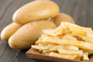 french fries on wood background