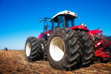 Red tractor in the field