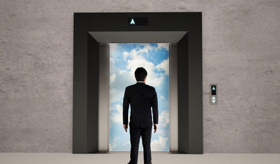 Fototapeta premium Business man and elevator open