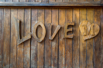 Old word Love with wooden on old wood background