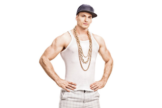 Young rapper with a blue cap and a golden chain