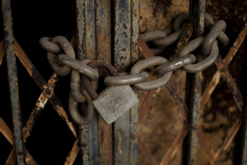 Rusty, iron, ruined padlock and chain