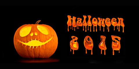 Illuminated Halloween Jack-o-lantern pumpkin and halloween 2015 text
