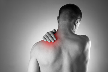 Man with pain in shoulder. Pain in the human body