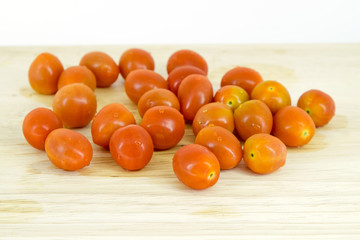 Cherry tomatoes on cutting board