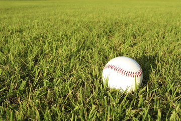 Baseball ball and lawn