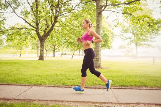 Side view of woman jogging 