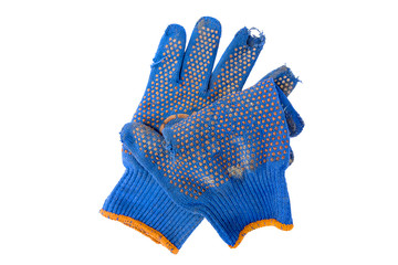 torn blue gloves for working in the ground