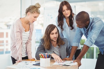 Business team discussing at desk 