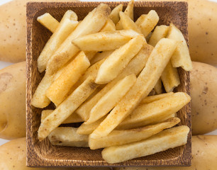 french fries on wood plate