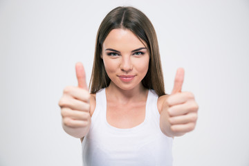 Portrait of a pretty woman showing thumbs up