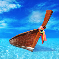  wooden boat in the blue sea