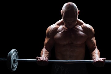 Fototapeta na wymiar Muscular man lifting crossfit