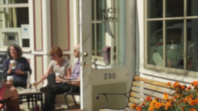 People sitting outside a bistro