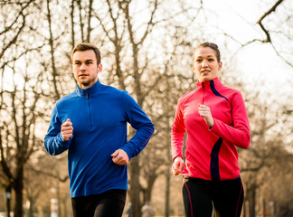 Fototapeta premium Couple jogging together