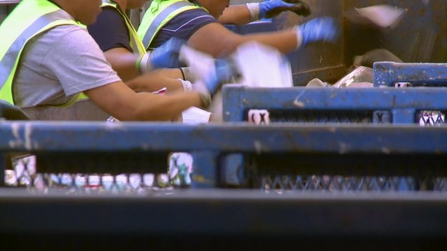 Hard-working recycling workers