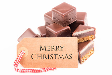 merry christmas tafel mit dominosteinen