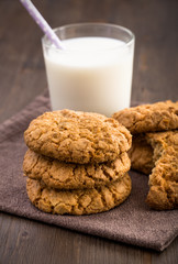 Oat cookies and milk on napkin