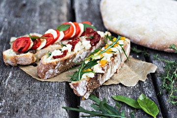 bruschetta set on vintage wooden board