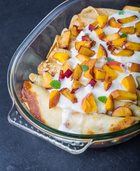 Pancakes with cottage cheese and peach doused sour cream