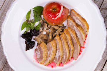 Roasted Duck Breasts with Mushroom, Apple and Plums Stuffing in Red Wine Sause