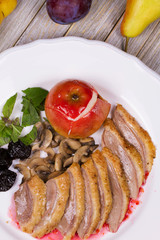 Roasted Duck Breasts with Mushroom, Apple and Plums Stuffing in Red Wine Sause