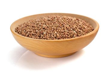 buckwheat in bowl isolated on white
