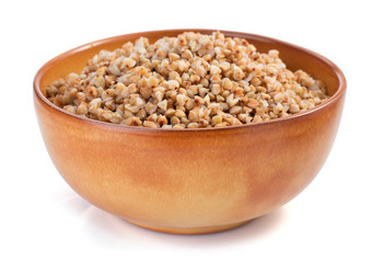 buckwheat in bowl isolated on white