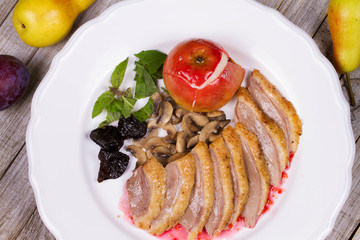 Roasted Duck Breasts with Mushroom, Apple and Plums Stuffing in Red Wine Sause