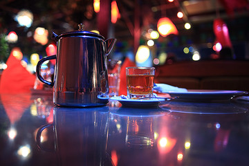cup of tea at a cafe blurred background