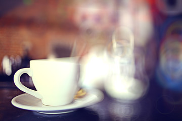 cup of tea at a cafe blurred background