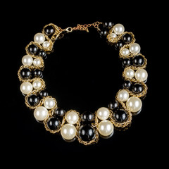 necklace on a black background
