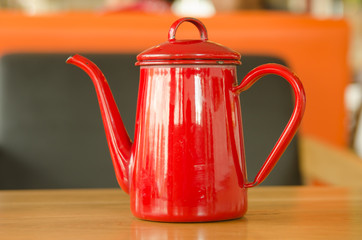 Red pot of hot water.