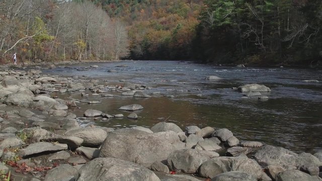 Scenic view of rock-lined river