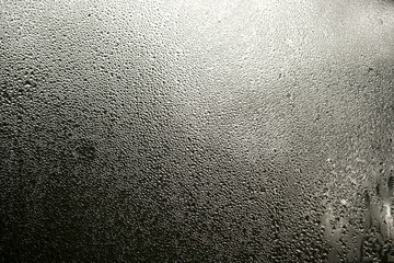 condensation droplets in a window glass, nature abstract backgro