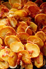 Crisp golden fried potato slices with bacon
